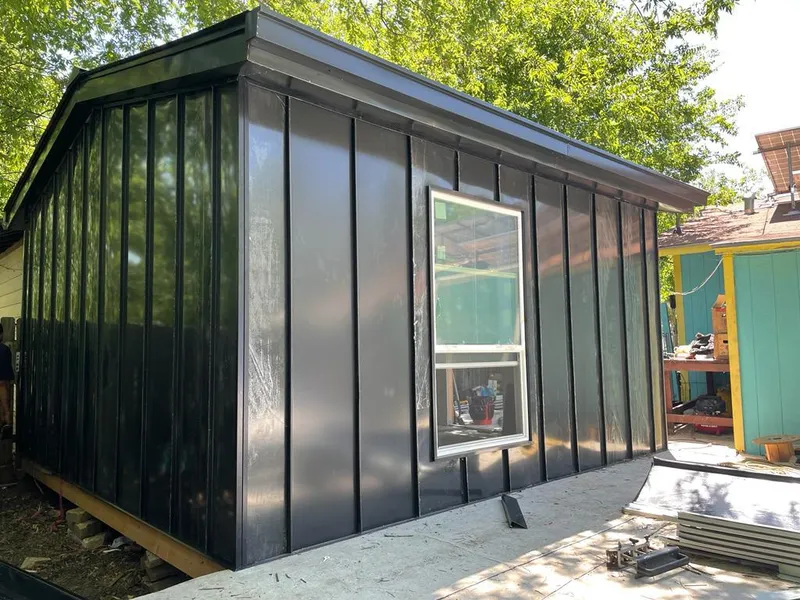 Black standing seam metal wall panels for Metal Roof Installation in Harwich