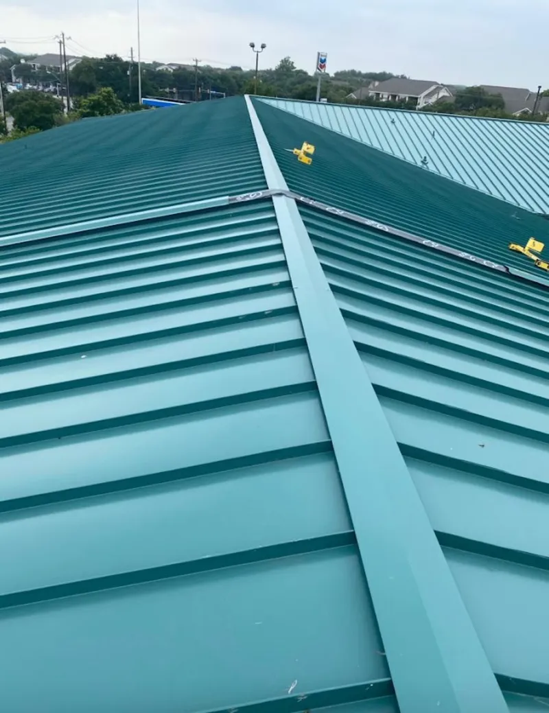 Green commercial metal roof ridge and valley for Metal Roof Repair in Harwich